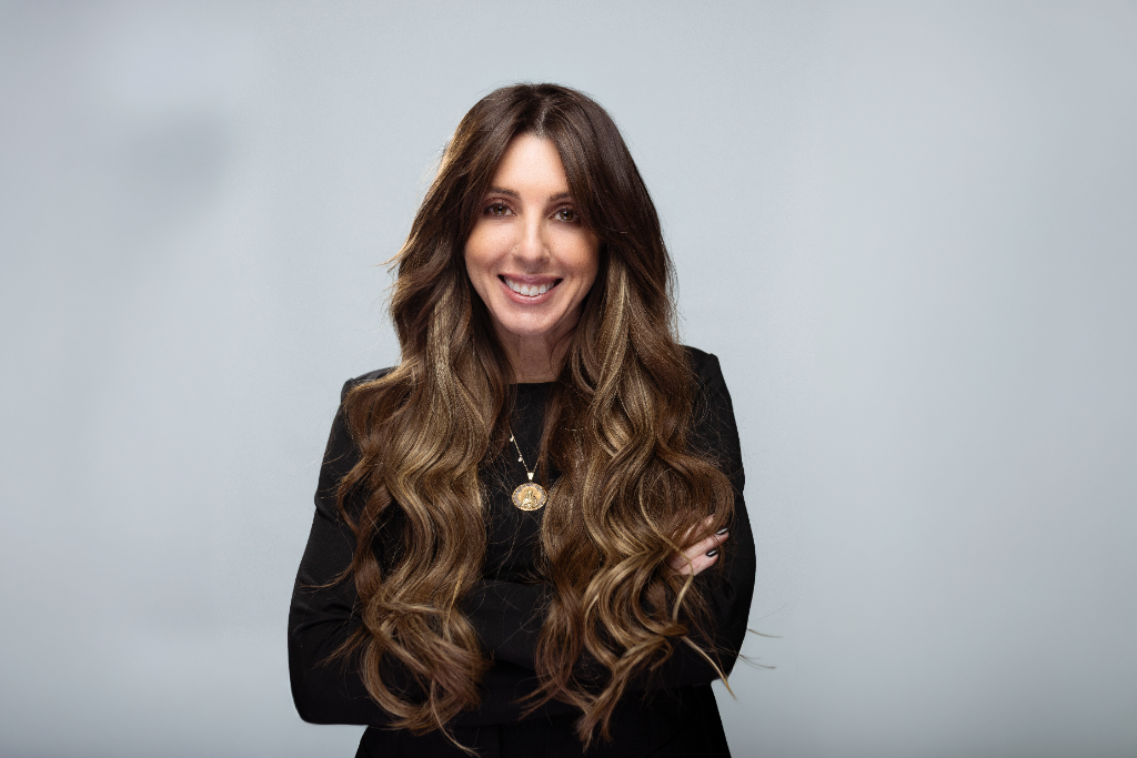 Michelle Kaskie, founder of Mixie Mane, wearing her patent-pending halo extensions